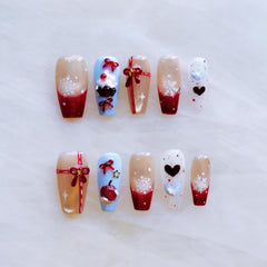 GLORS Christmas nails with red cat eye and 3D bows for festive glamour