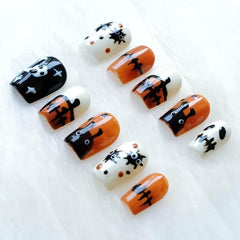GLORS Halloween nails dripping design adds dramatic shade and eerie vibe