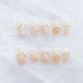 GLORS luxury pearl press-on nails in ballerina medium shape for a sophisticated at-home manicure.