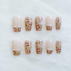 GLORS Nude pink nails with pearl accents for refined everyday glamour