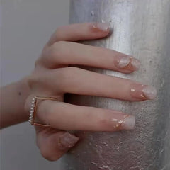 GLORS pearlescent white base nails highlighting shimmering finish for special occasions.