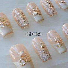 GLORS Purly nails featuring geometric shell pieces for subtle dimension.