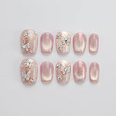 GLORS Unique Art Nail pink cat eye with butterflies and flowers for glamorous everyday style.