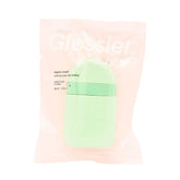 Glossier Hand Cream Sandstone pod close-up highlighting quick absorption and soothing hydration.