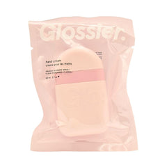 Glossier Hand Cream packaging in Orange Blossom Neroli, compact and fast-absorbing.