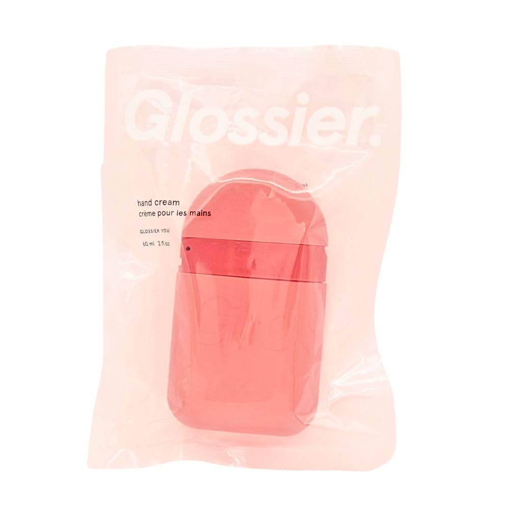 Glossier You hand cream pod being used for on the go hydration and smooth hands