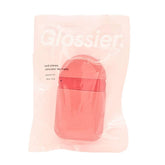 Glossier You hand cream pod being used for on the go hydration and smooth hands