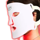 Glov Beauty LED mask on face for at-home rejuvenation and precision red-blue light therapy.