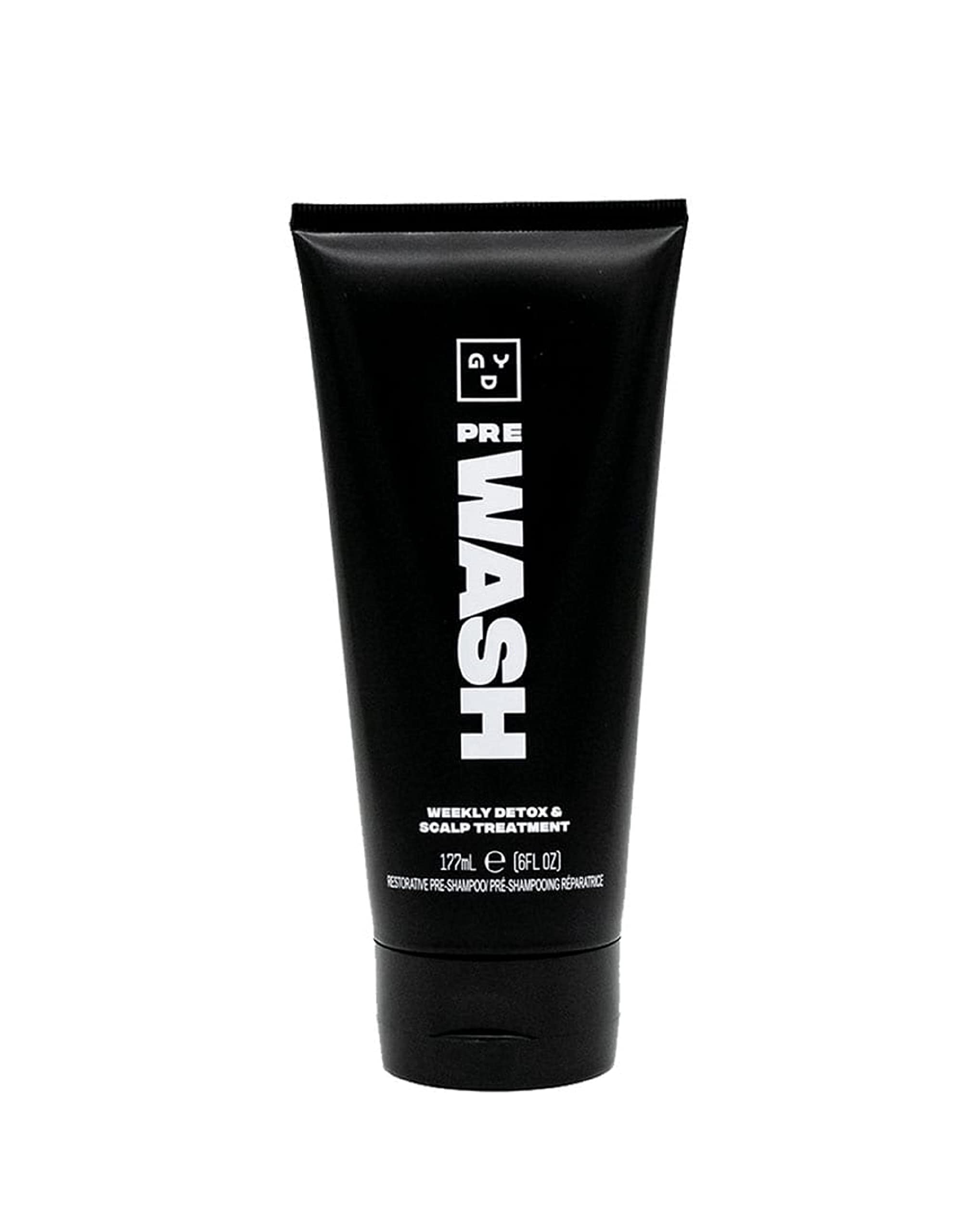 Good Dye Young scalp scrub bottle for gentle pre-wash cleansing.