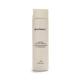 Goop Beauty Amino Acid Conditioner bottle demonstrates detangling-friendly formula.