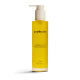 goop Beauty Body Oil bottle with pour showing luxurious, quick-absorb hydration.