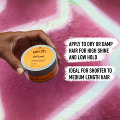 Got2b Defiant Shine Pomade hands warming the product for easy application.