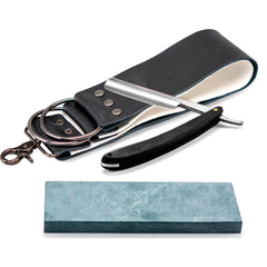 Grandslam straight razor with black wood handle for precise, traditional shaves.