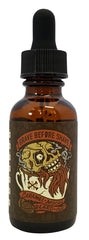 Grave Before Shave beard balm texture closeup ready for application.