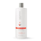 Great Clips Solutions Clarifying Shampoo bottle front; removes mineral buildup for clearer hair.