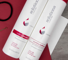 Argan oil glow close-up beside GREAT CLIPS conditioner