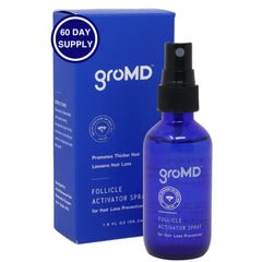 GroMD hair loss serum bottle shown for easy daily use with thinning hair.
