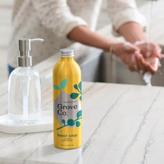 Kraft box packaging open to reveal Grove Co. refill set