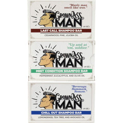 Grown Ass Man Co. solid bar ingredients and conditioning oils close-up for scalp care.