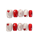 GUAACCB heart press-on nails in short coffin shape with glitter stars for fast, salon-style manicures