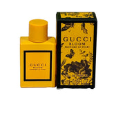 Gucci Bloom mini bottle closeup for dab application and travel-friendly elegance.