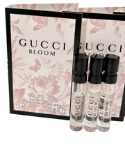 Gucci Bloom sample trio shows compact EDT bottles for easy packing.
