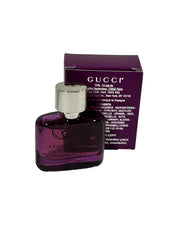 Gucci Guilty Elixir mini packaging travel-ready presentation for daily carry.