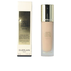 Guerlain Parure Gold foundation bottle close-up with matte finish for all-day wear.