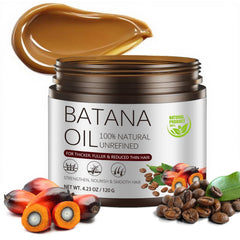 Gulizzmonis Batana Oil bottle promotes shine and scalp nourishment.