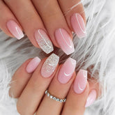 GXOIPNS light pink short coffin nails for quick fashion touch-ups.