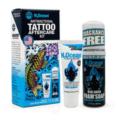 H2Ocean antibacterial tattoo foam soap in a blue-green bottle for gentle cleansing of new tattoos.
