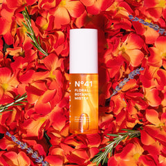 Habit N°41 mist applied over makeup for seamless, rub-free refresh.