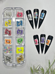 HaFLoNa 3D Ruby Glow medium flower charms add dimensional nail detail.