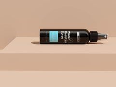 Hair Illusion running water test demonstrates spray resilience against immersion.