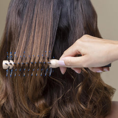 Hair Rituel smooths frizz and adds natural shine while drying.