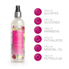 Spritzing Hairfinity Rice Water Hair Mist on damp curls to reduce frizz and boost shine.