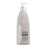 Hairmax Density Conditioner bottle pour demonstrates easy application for thinning hair