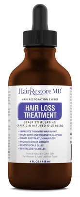 HairRestore MD DHT Blocker Oil cayenne bottle boosts scalp circulation.