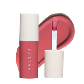 HALEYS Re-dew Lip Gloss bottle application for hydrating shine that lasts.