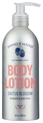 Hand in Hand Cactus Blossom Body Lotion bottle shows vegan hydration in sustainable packaging.