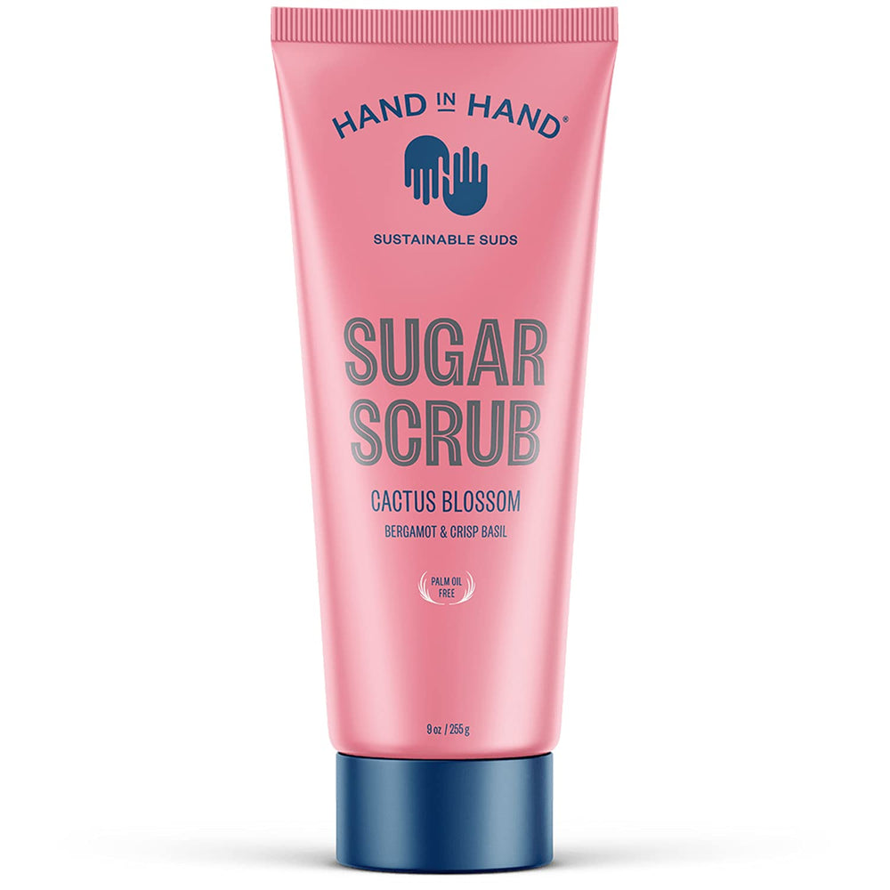 Hand in Hand Sugar Scrub bottle pour demonstrates easy application and gentle exfoliation.