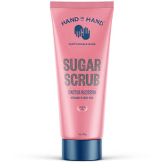 Hand in Hand Sugar Scrub bottle pour demonstrates easy application and gentle exfoliation.