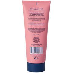 Hand in Hand Sugar Scrub texture closeup shows granular exfoliants for radiant skin.