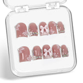 Handmade press-on nails with 3D flower and rhinestones for elegant occasions.