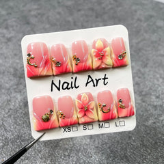 Handmade press-on nails with moon and shell designs for elegant home spa nails