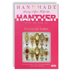 Hantyer Gold Madonna and Cross charms on nails for vintage flair
