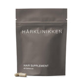 Harklinikken Hair Supplement bottle shown for daily nourishment and consistency