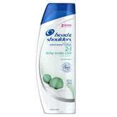Head & Shoulders Itchy Scalp Care bottle pour for 2-in-1 relief.