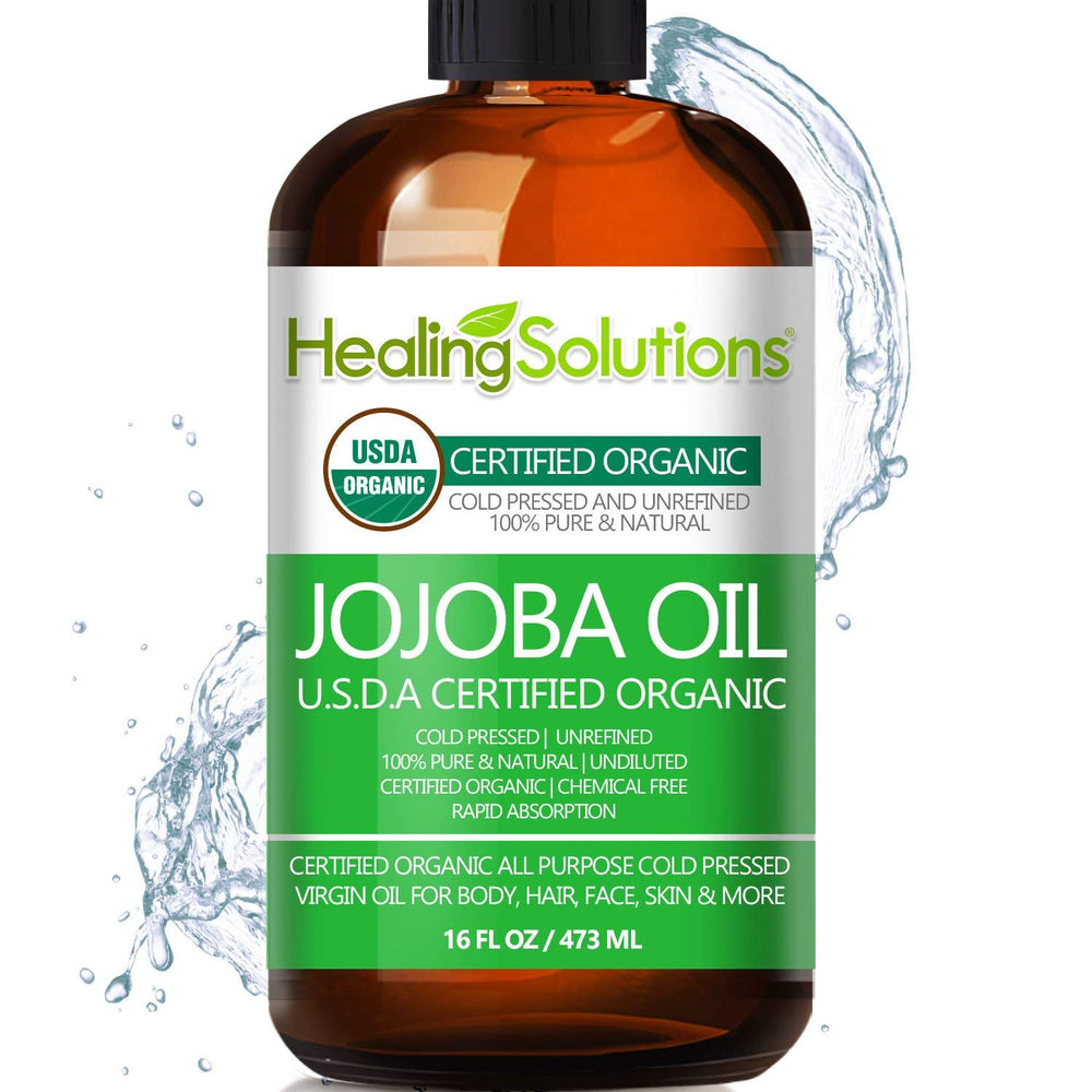 Healing Solutions Jojoba Oil bottle pouring for daily hair and skin hydration.