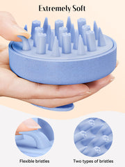 HEETA ergonomic handle scalp massager designed for a comfortable grip during wet use.